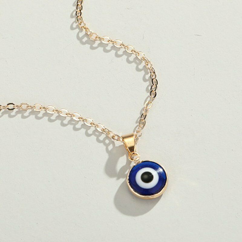 Small Evil Eye gold tone necklace